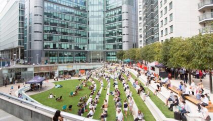 employees enjoying nature on a stepped terrace outside office building