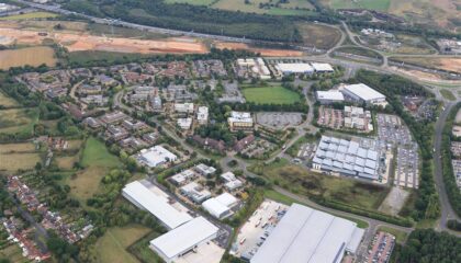 ariel shot of business park buildings surrounded by fields